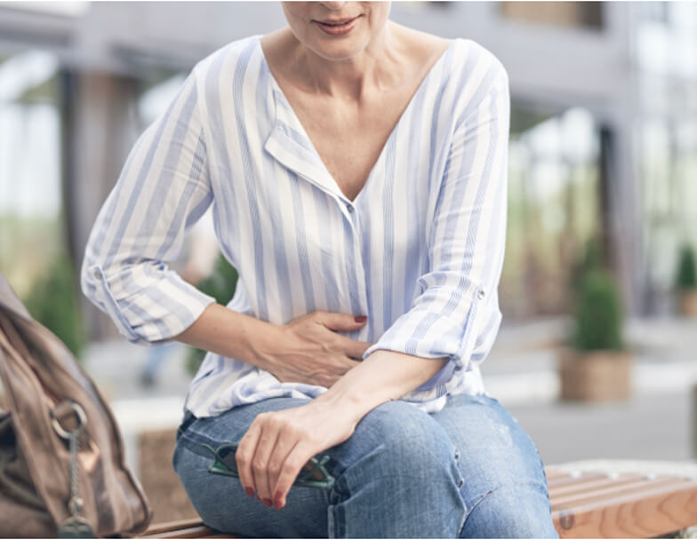 Вздутие живота у женщин: причины и симптомы